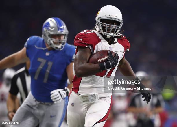 Josh Bynes of the Arizona Cardinals runs the ball in the game against the Detroit Lions Ford Field on September 10, 2017 in Detroit, Michigan.