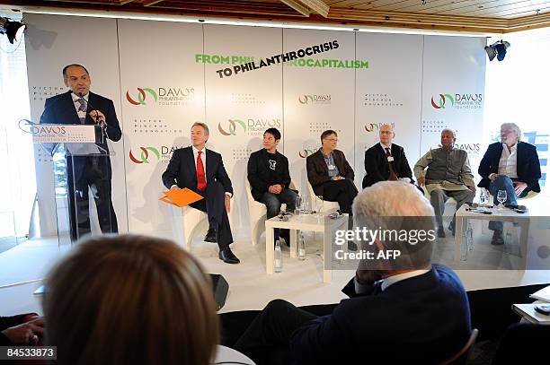 Victor Pinchuk, Founder of EastOne and of the Victor Pinchuk Foundation talks as former US President Bill Clinton listens in Davos on January 29,...