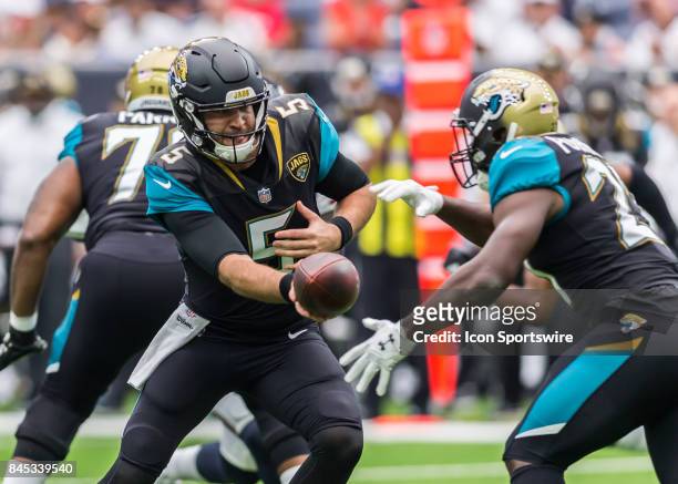 Jacksonville Jaguars quarterback Blake Bortles hands the ball to Jacksonville Jaguars running back Leonard Fournette during the NFL game between the...