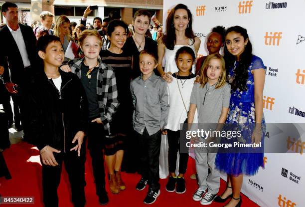 Kimhak Mun, Shiloh Jolie-Pitt, Nora Twomey, Knox Leon Jolie-Pitt, Angelina Jolie, Zahara Jolie-Pitt, Vivienne Jolie-Pitt and Saara Chaudry attend...