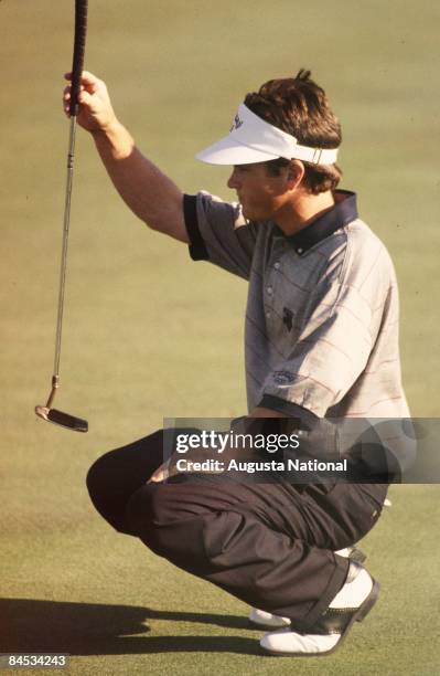 Brian Henninger lines up his putt during the 1995 Masters Tournament at Augusta National Golf Club on April 1995 in Augusta, Georgia.
