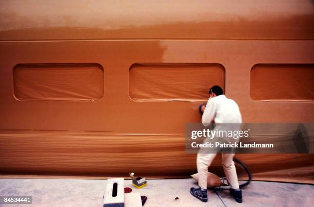 The finished undercoat will be sanded down and any possible defects on the surface are retouched. The carriage is ready to receive the finishing...