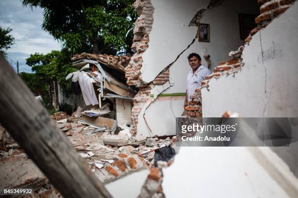 People clean their homes after the earthquake in Juchitan, Mexico on 10, September 2017. An earthquake with a magnitude of 8.2 and epicenter in the...