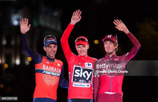 Madrid, SPAIN Britain's Chris Froome of Team Sky celebrates on the podium with second placed Italy's Vincenzo Nibali of the Bahrain-Merida's team and...
