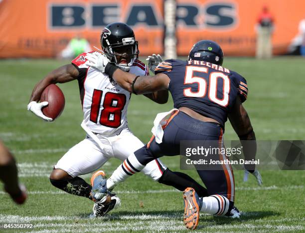 Jerrell Freeman of the Chicago Bears attempts to tackle Taylor Gabriel of the Atlanta Falcons in the third quarter at Soldier Field on September 10,...
