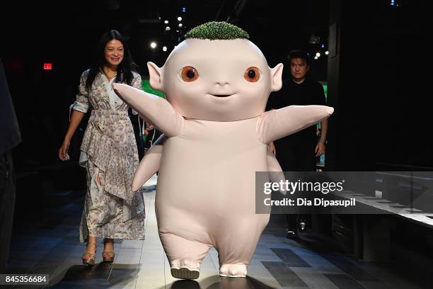 Designer Vivienne Tam an Wuba prepare backstage for Vivienne Tam fashion show during New York Fashion Week: The Shows at Gallery 1, Skylight Clarkson...