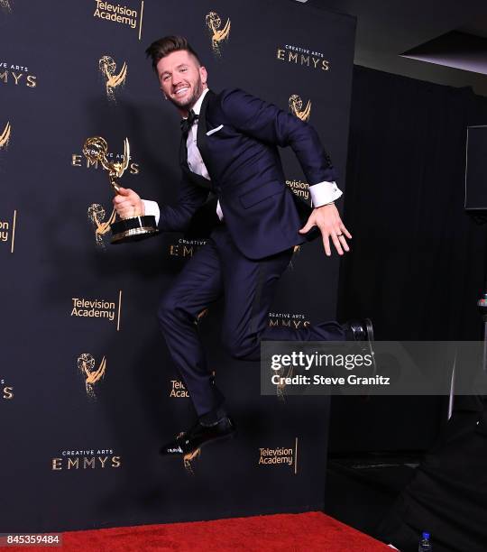 Travis Wall poses at the 2017 Creative Arts Emmy Awards - Day 1 - Press Room at Microsoft Theater on September 9, 2017 in Los Angeles, California.