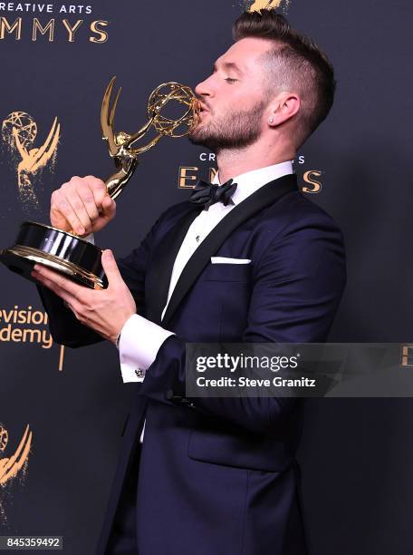 Travis Wall poses at the 2017 Creative Arts Emmy Awards - Day 1 - Press Room at Microsoft Theater on September 9, 2017 in Los Angeles, California.