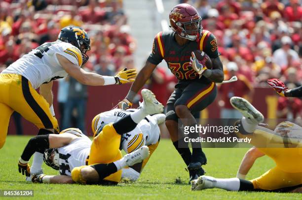 Running back David Montgomery of the Iowa State Cyclones drives the ball through the Iowa State Cyclones defense as he rushed for yards in the second...