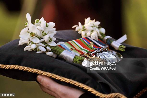 The Campaign Medals of William Stone from Berkshire, one of Britain's last veterans of the First World War who died aged 108, are carried from St...