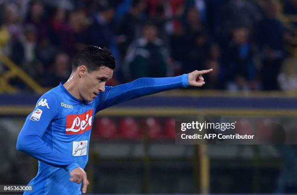 Napoli Spanish forward Jose Callejon celebrates after scoring during the Italian Serie A football match Bologna vs Napoli at the Dallara Stadium in...