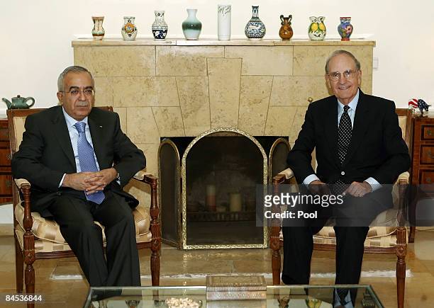 Palestinian Prime Minister Salam Fayyad meets US envoy for the Middle East, George Mitchell at the US Consulate on January 29, 2009 in Jerusalem,...
