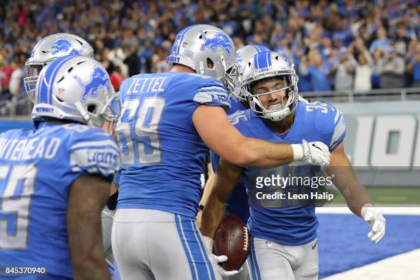 Miles Killebrew of the Detroit Lions celebrates a play with teammates in the game against the Arizona Cardinals at Ford Field on September 10, 2017...