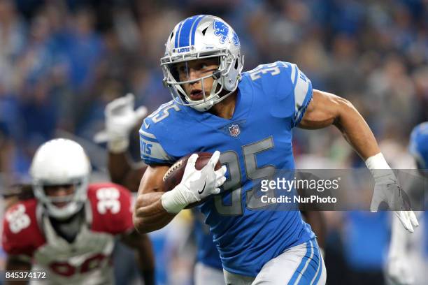Detroit Lions strong safety Miles Killebrew runs the ball during the second half of an NFL football game against the Arizona Cardinals in Detroit,...