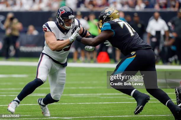 Watt of the Houston Texans is blocked by Jermey Parnell of the Jacksonville Jaguars at NRG Stadium on September 10, 2017 in Houston, Texas.