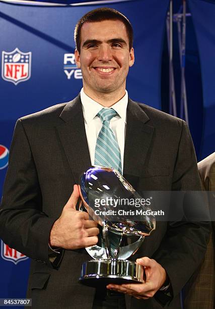 Joe Flacco of the Baltimore Ravens poses with the trophy after being named the "Diet Pepsi Rookie of the Year" during a press conference at the Tampa...