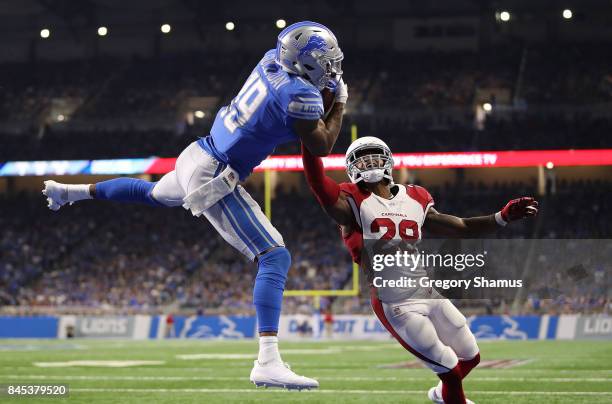 Kenny Golladay of the Detroit Lions catches a fourth quarter touchdown next to Justin Bethel of the Arizona Cardinals at Ford Field on September 10,...