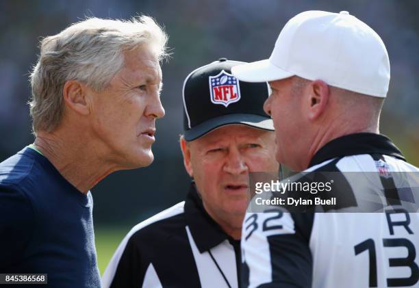 Head coach Pete Carroll of the Seattle Seahawks argues a call with referee John Parry during the first half of the game between the Seattle Seahawks...