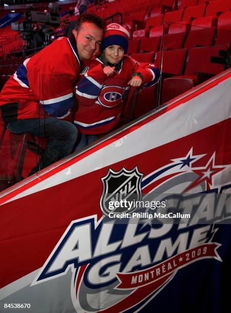 Father and son duo pose for a photo just outside of the dressing room to the Western Conference All Stars before NHL All Star Game at Bell Centre on...