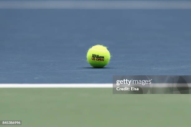 Tennis ball sits on the court during the Men's Singles finals match between Kevin Anderson of South Africa and Rafael Nadal of Spain on Day Fourteen...
