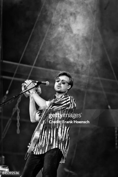 Singer Vincent Neff of the British band Django Django performs live on stage during second day at the Lollapalooza Festival on September 10, 2017 in...