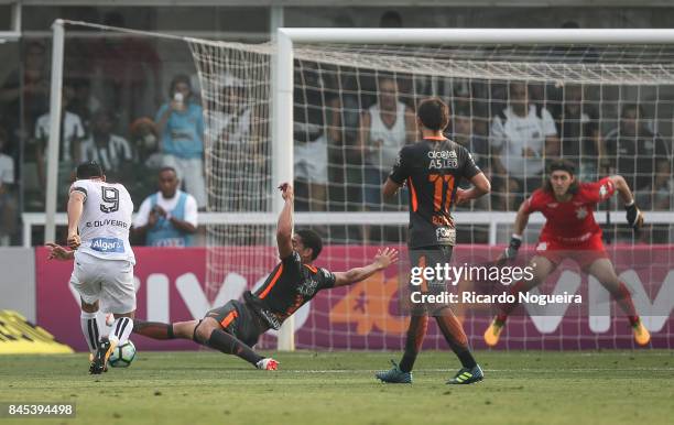 Ricardo Oliveira of Santos shoots at goal during the match between Santos and Corinthians as a part of Campeonato Brasileiro 2017 at Vila Belmiro...