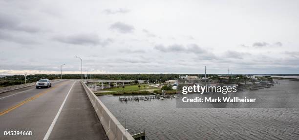 Pick up truck evacuates prior to the arrival of Hurricane Irma September 10, 2017 in the fishing town of Apalachicola, Florida. Hurricane Irma made...