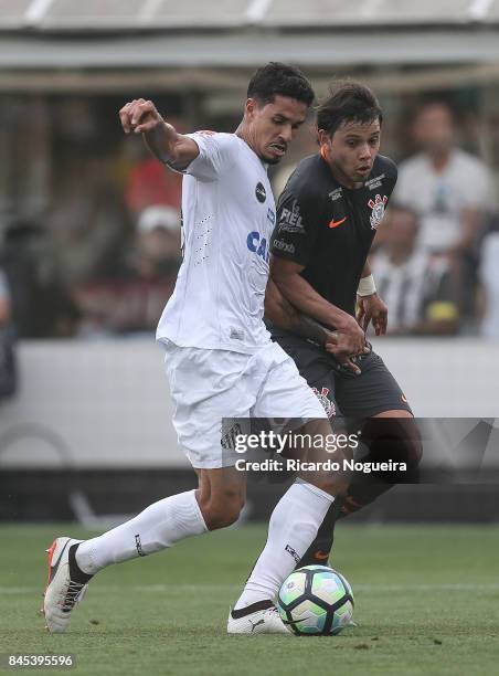 Lucas Verissimo of Santos battles for the ball with Romero of Corinthians during the match between Santos and Corinthians as a part of Campeonato...