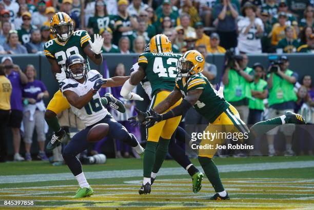 Tyler Lockett of the Seattle Seahawks is unable to make a reception in the end zone during the second quarter against the Green Bay Packers at...