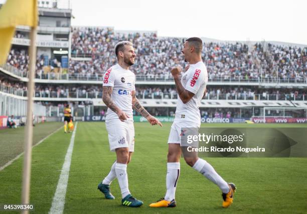 Lucas Lima celebrates his goal with Alison of Santos during the match between Santos and Corinthians as a part of Campeonato Brasileiro 2017 at Vila...