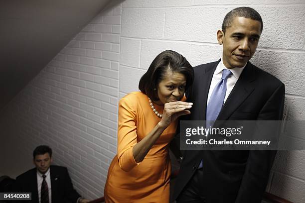 Democratic presidential hopeful Sen. Barack Obama and his wife Michelle Obama backstage before speaking during a rally at the North Carolina State...