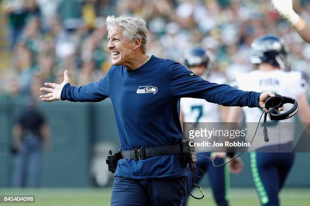 Head coach Pete Carroll of the Seattle Seahawks reacts to a play during the second half against the Green Bay Packers at Lambeau Field on September...