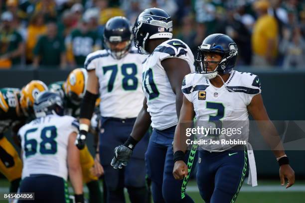 Russell Wilson of the Seattle Seahawks reacts during the second half against the Green Bay Packers at Lambeau Field on September 10, 2017 in Green...