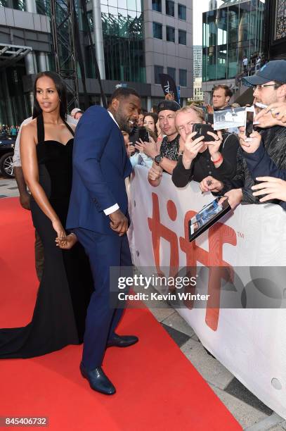 Sabrina Dhowre and Idris Elba attend "The Mountain Between Us" premiere during the 2017 Toronto International Film Festival at Roy Thomson Hall on...