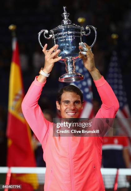 Rafael Nadal of Spain poses with the championship trophy during the trophy ceremony after he defeated Kevin Anderson of South Africa in the Men's...