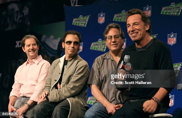 Max Wineburg and Bruce Springsteen of the E Street Band speak at the Bridgestone Super Bowl XVLII Half Time Show Press Conference held at the Tampa...
