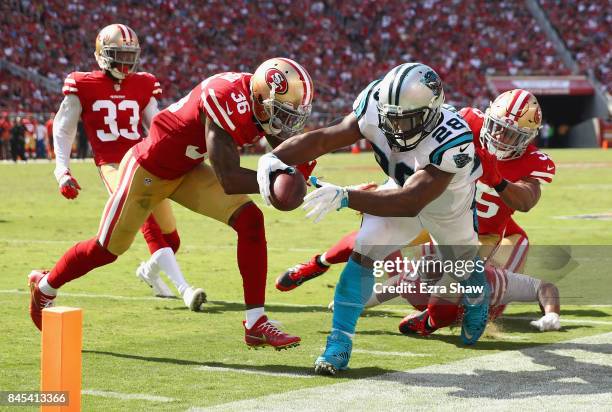 Jonathan Stewart of the Carolina Panthers is forced out of bounds by San Francisco 49ers at Levi's Stadium on September 10, 2017 in Santa Clara,...
