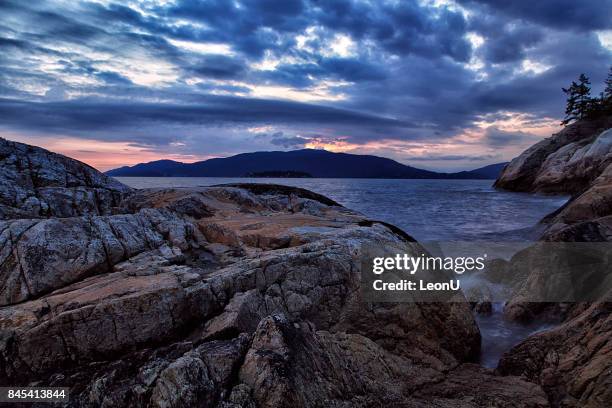 lighthouse park sunset in summer, west vancouver, bc, canada - northpark stock pictures, royalty-free photos & images