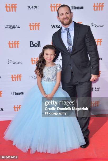 Child actress Brooklynn Prince and her father attend the "The Florida Project" premiere at the Ryerson Theatre on September 10, 2017 in Toronto,...