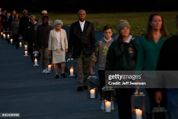 Family and friends of the victims carry candles at Flight 93 National MemorialÕs annual Luminaria on the eve of 16th Anniversary ceremony of the...