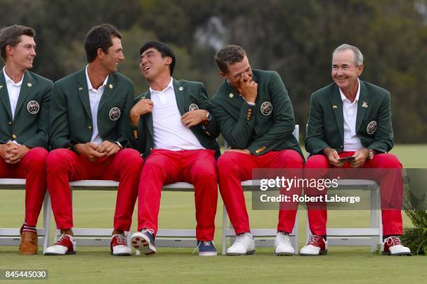 Maverick McNealy, Stewart Hagestad, Doug Ghim, Cameron Champ and team captain John "Spider" Miller have a laugh during the trophy ceremony after Team...
