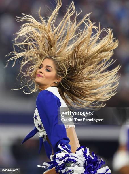 Dallas Cowboys Cheerleader performs during a game against the New York Giants at AT&T Stadium on September 10, 2017 in Arlington, Texas.