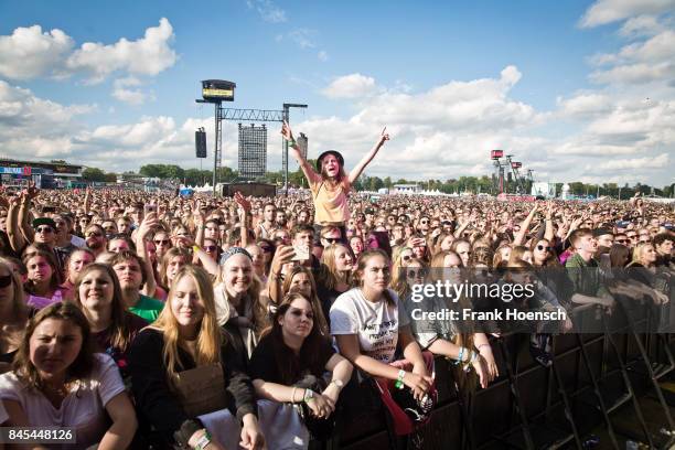 Fans are seen during the second day of Lollapalooza Festival on September 10, 2017 in Dahlwitz-Hoppegarten, Germany. .
