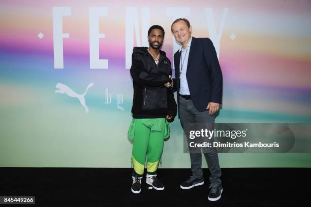 Rapper Big Sean and CEO of PUMA Bjoern Gulden attends the FENTY PUMA by Rihanna Spring/Summer 2018 Collection at Park Avenue Armory on September 10,...