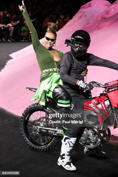 Rihanna waves from the back of a motorcycle at the finale of the Fenty Puma by Rihanna show during New York Fashion Week at the 69th Regiment Armory...