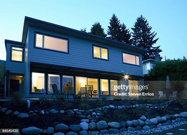 exterior of suburban home at dusk - terrace british columbia stock pictures, royalty-free photos & images