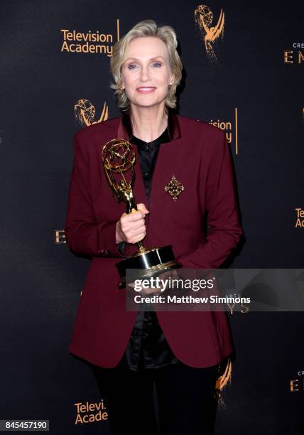Actress Jane Lynch poses in the press room at the 2017 Creative Arts Emmy Awards at Microsoft Theater on September 10, 2017 in Los Angeles,...