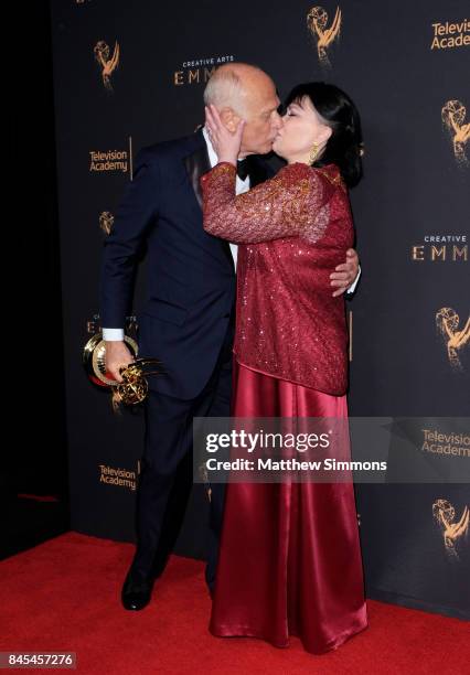 Actors Delta Birke and Gerald McRaney pose in the press room at the 2017 Creative Arts Emmy Awards at Microsoft Theater on September 10, 2017 in Los...