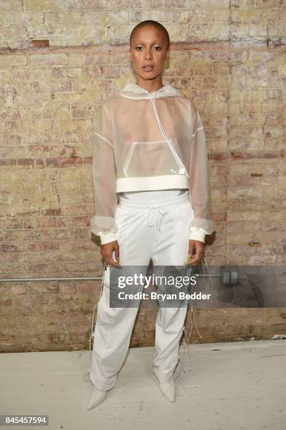 Adwoa Aboah poses backstage at the FENTY PUMA by Rihanna Spring/Summer 2018 Collection at Park Avenue Armory on September 10, 2017 in New York City.