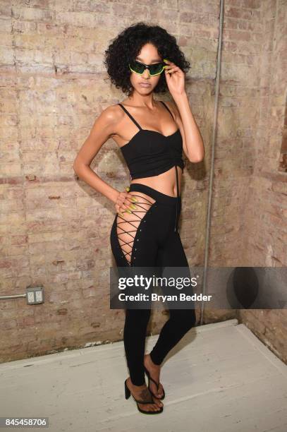 Damaris Goddrie poses backstage at the FENTY PUMA by Rihanna Spring/Summer 2018 Collection at Park Avenue Armory on September 10, 2017 in New York...